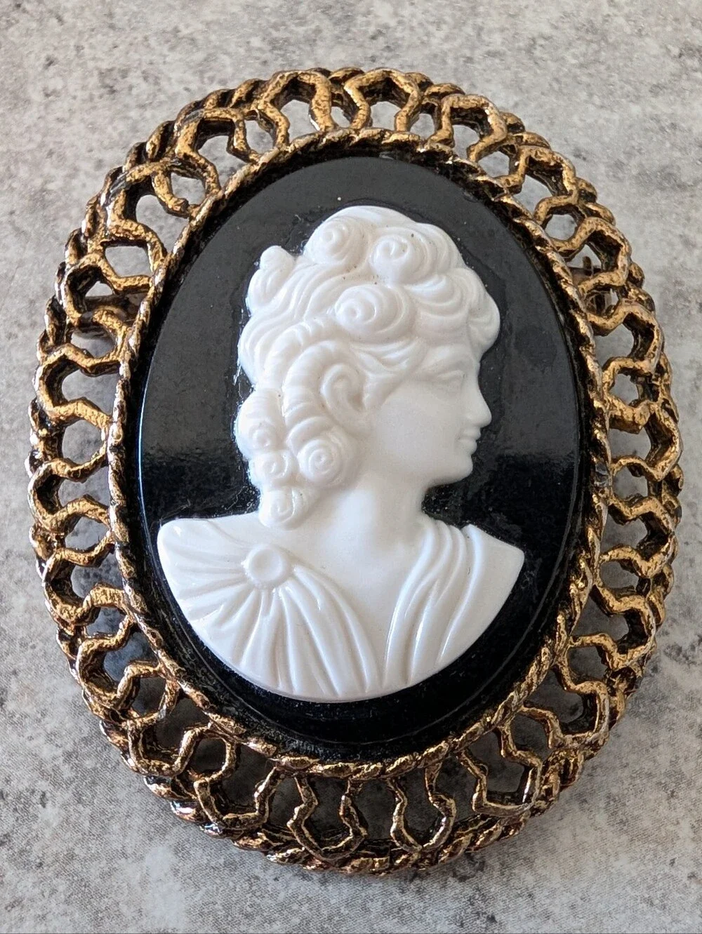 Classic Black and White Cameo Brooch with Gold Frame